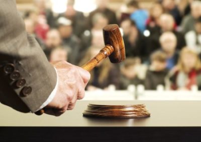 Don’t Get Hammered Buying at an Auction